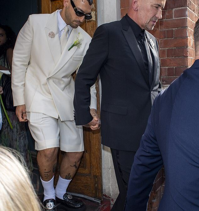 Fat Tony is married! DJ, 58, exchanges vows with Stavros Agapiou, 32, in front of celebrity friends Boy George, Claire Sweeney and Davina McCall