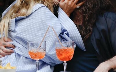 Heidi Klum, 51, and husband Tom Kaulitz, 35, look as loved-up as ever as they pack on the PDA while enjoying drinks out in Paris