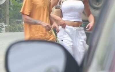 Zara McDermott and Louis Tomlinson can’t keep their hands off each other as he cheekily grabs her bottom during romantic getaway to sun-soaked Costa Rica